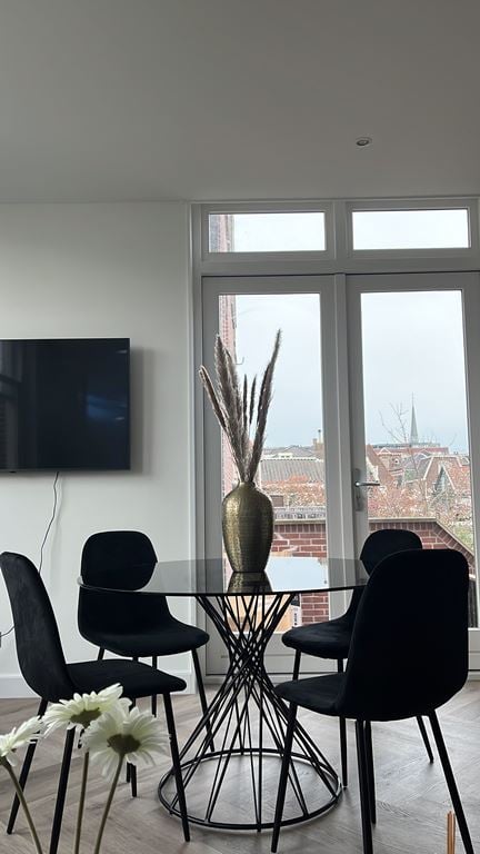 Kave Home Niut Eettafel - Ø 120 cm - Zwart Glas