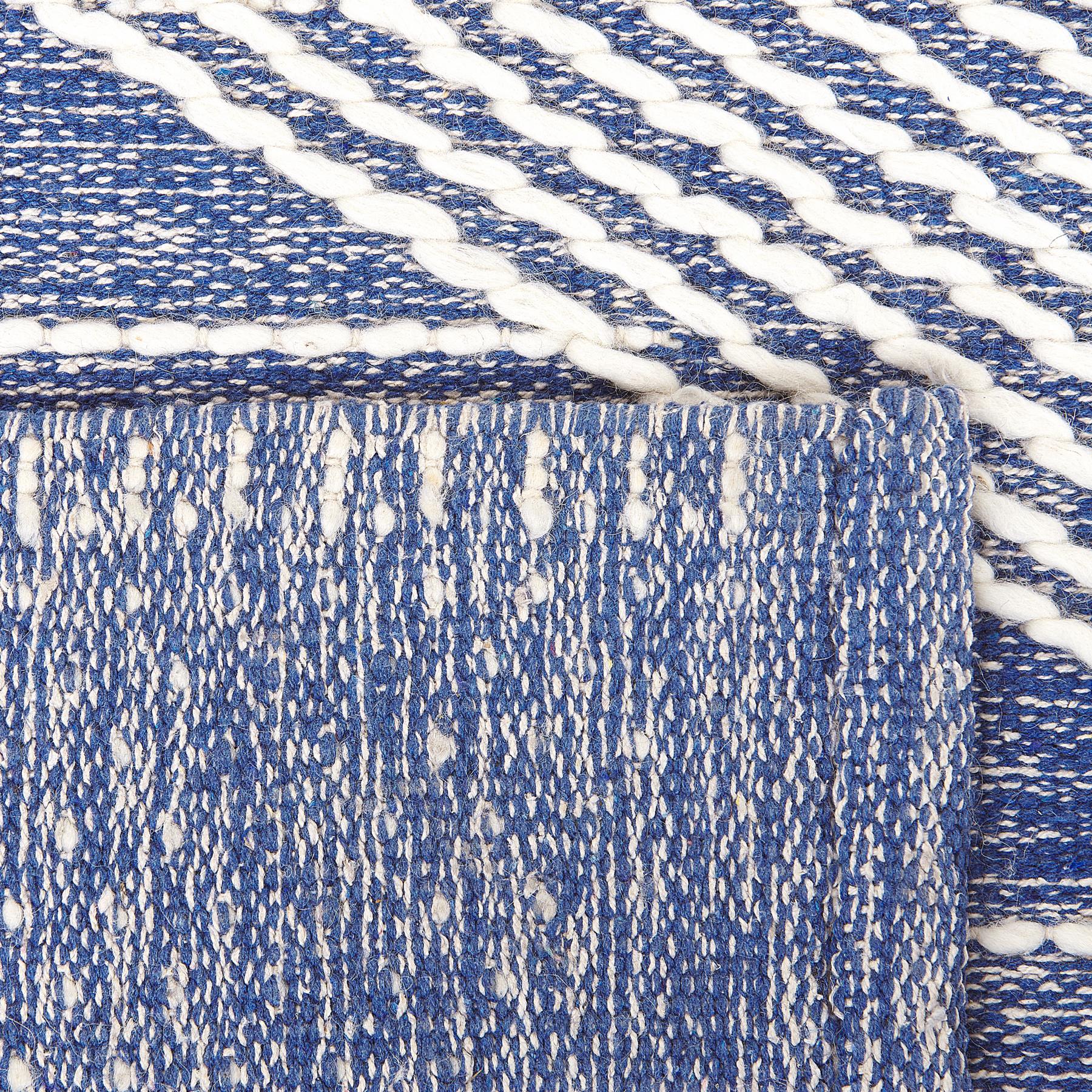 Beliani - DATCA - Laagpolig vloerkleed - Blauw - 140 x 200 cm - Wol