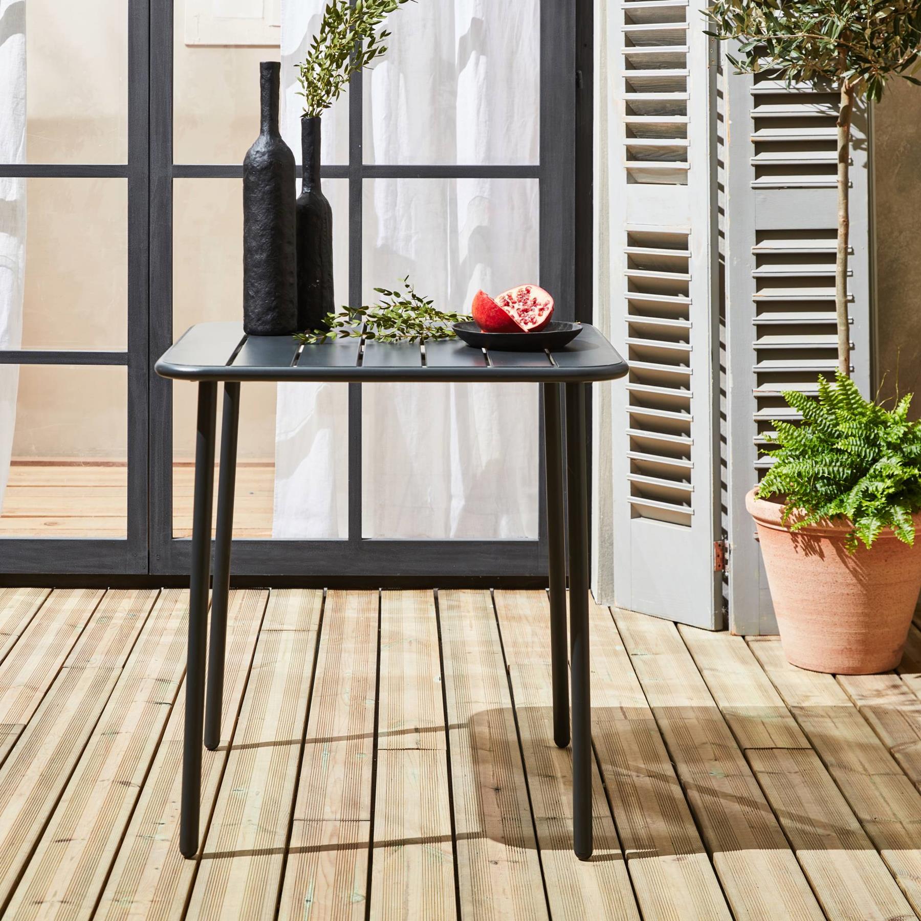sweeek - 2-zits metalen tuintafel