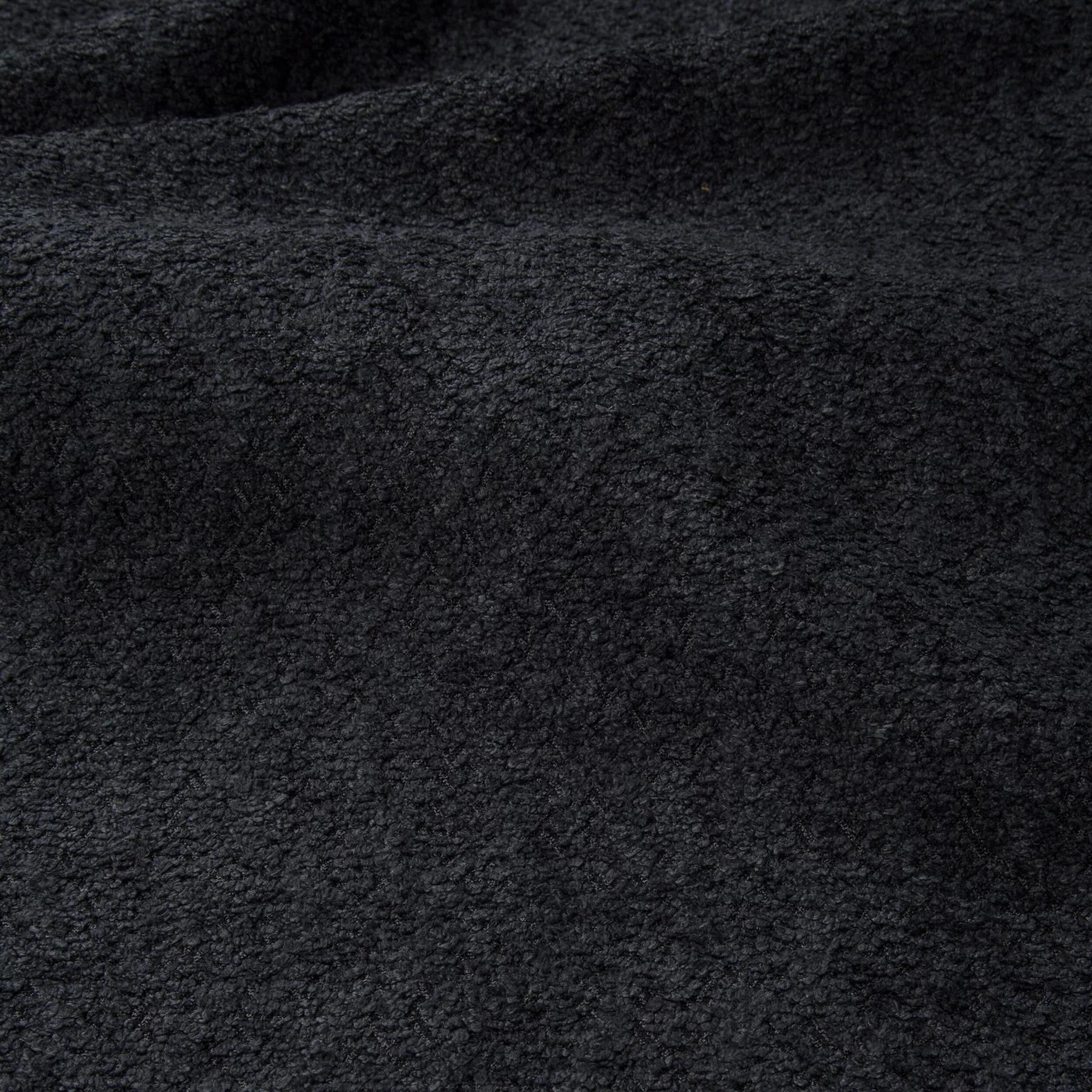 Fauteuil van zwarte krulstof